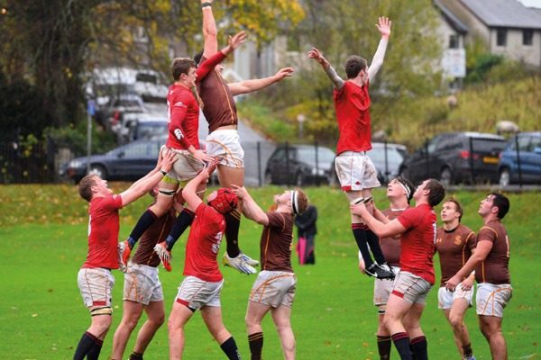 Rugby players competing for the ball at a lineout